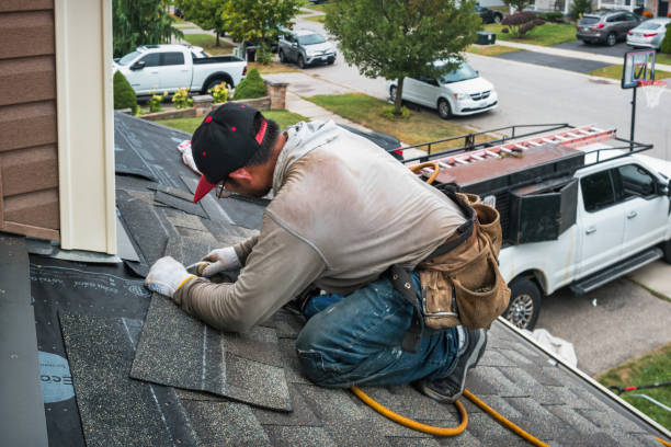 Professional Roofing technician working in Clinton, WA